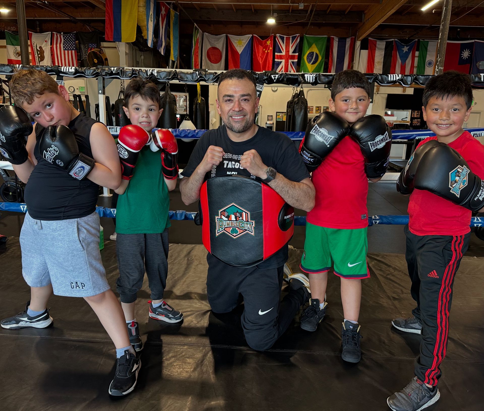 Four young boys with coach