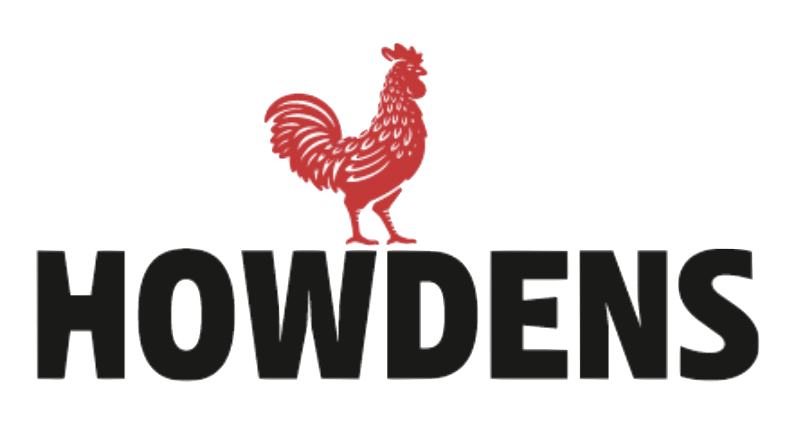 A red rooster is sitting on top of the word howdens