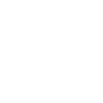 A person in a black coat and scarf stands in a wintry forest, reaching toward a glowing, floating orb of light.