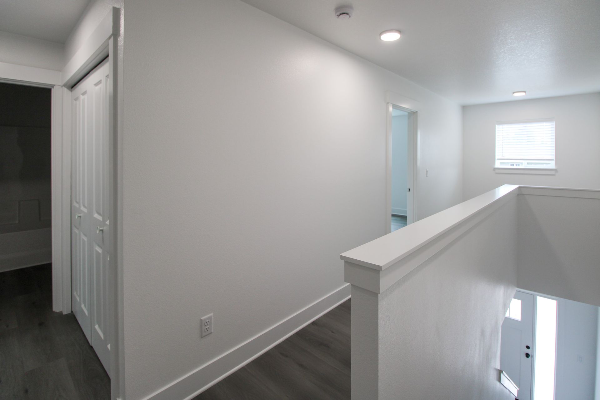 There is a staircase leading up to the second floor of a house.