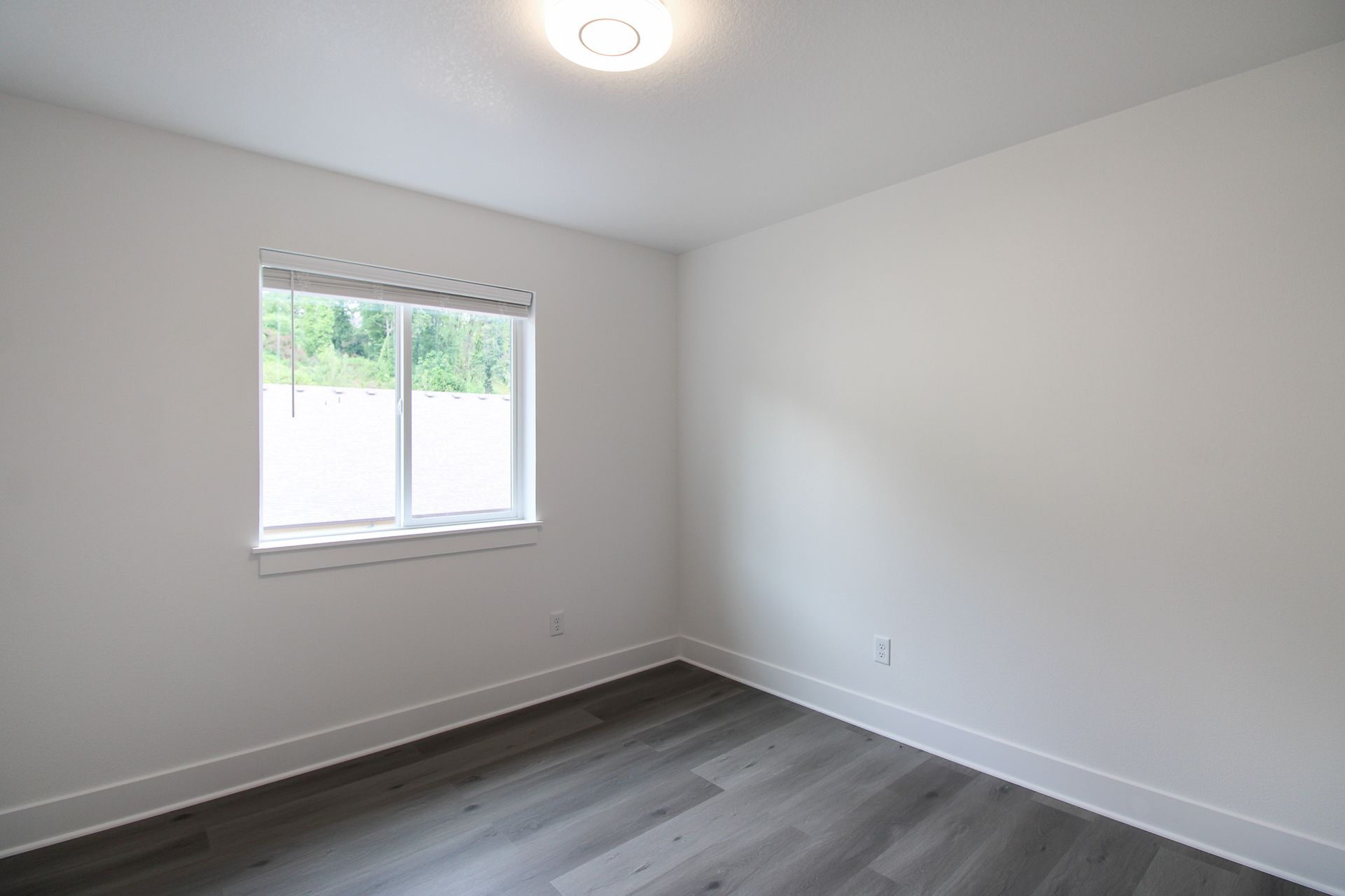 There is a window in the middle of the room.