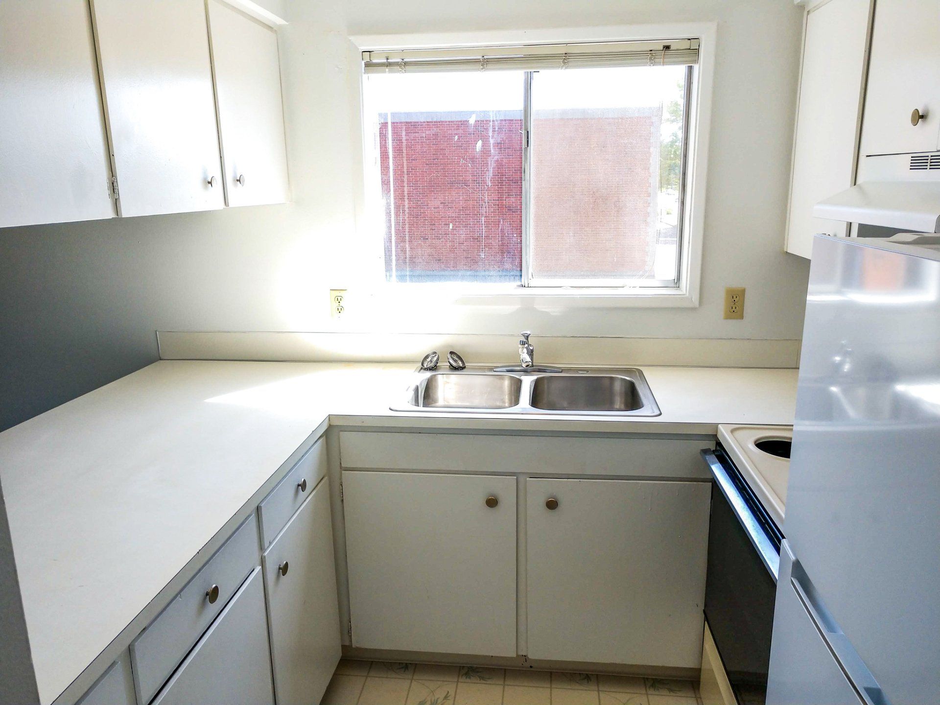 Crown Property Management, Inc. The Apartments at Elizabeth Gardens