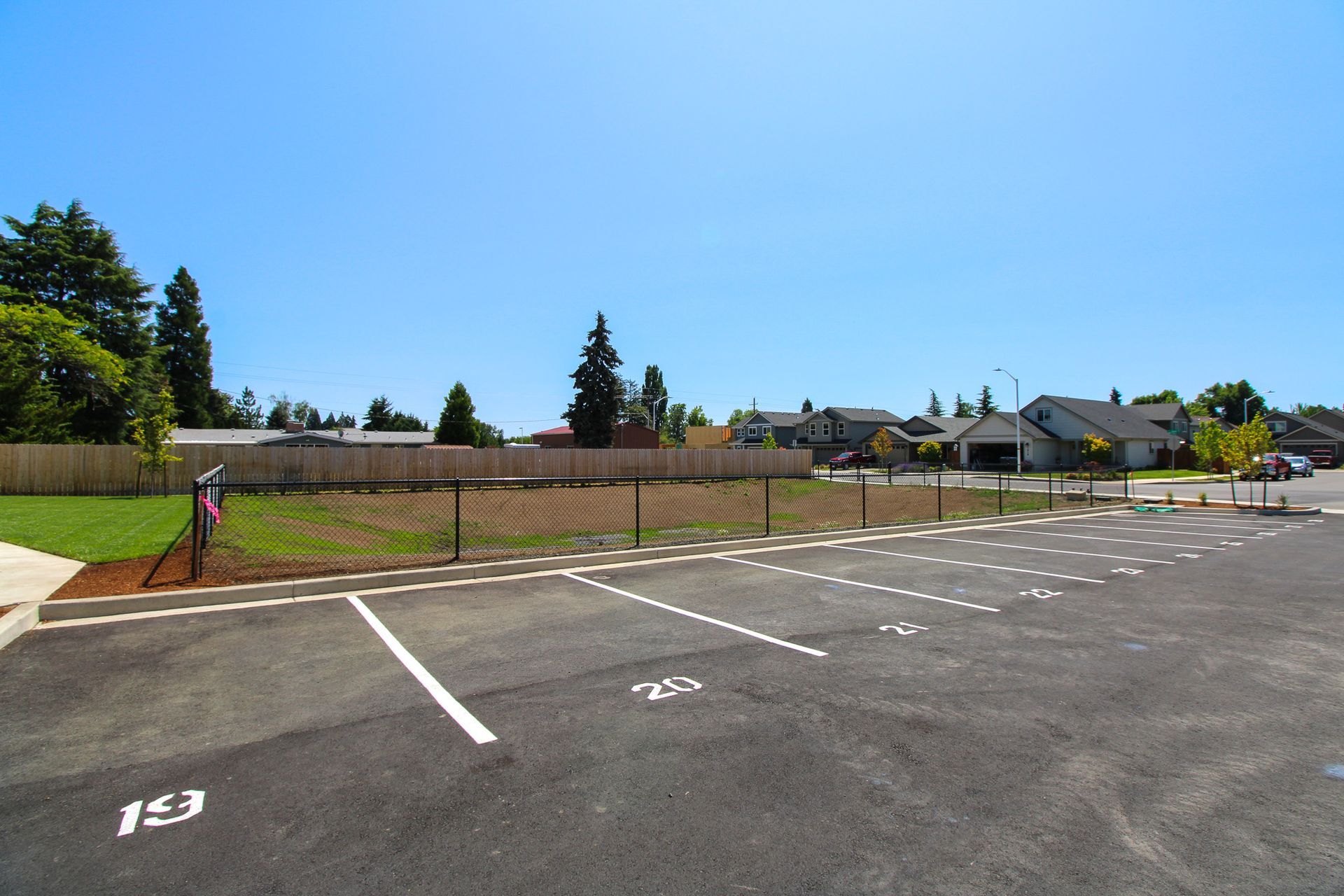 A parking lot with the number 153 painted on it