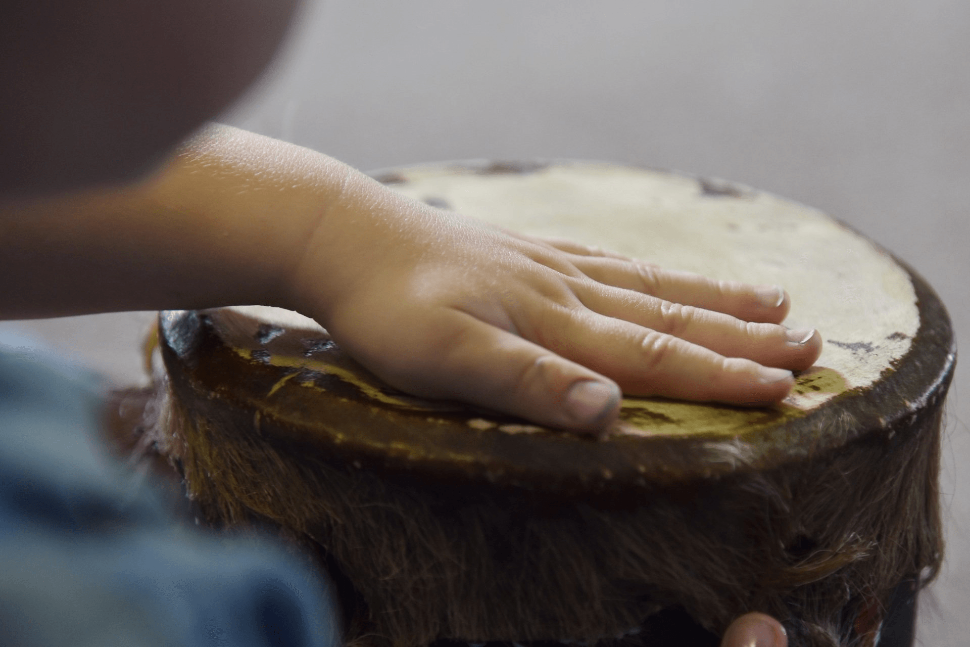 music being played on a bongo drum