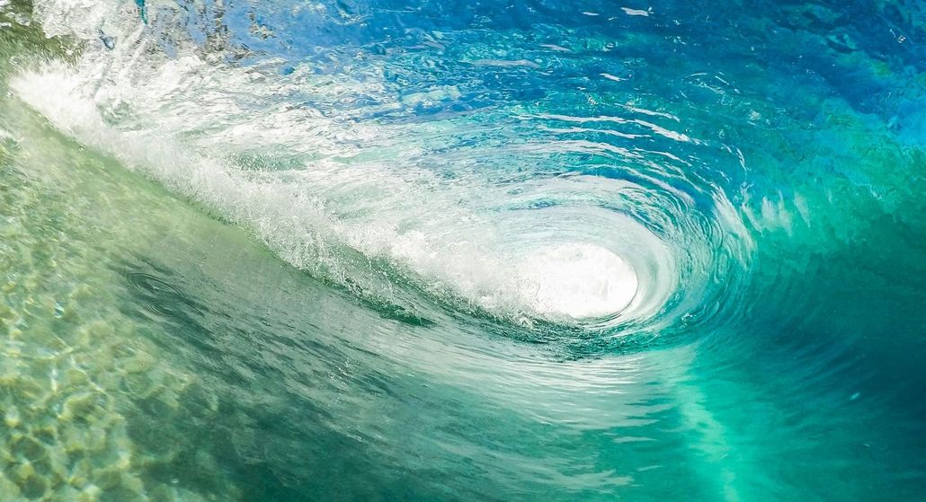 A close up of a wave in the ocean