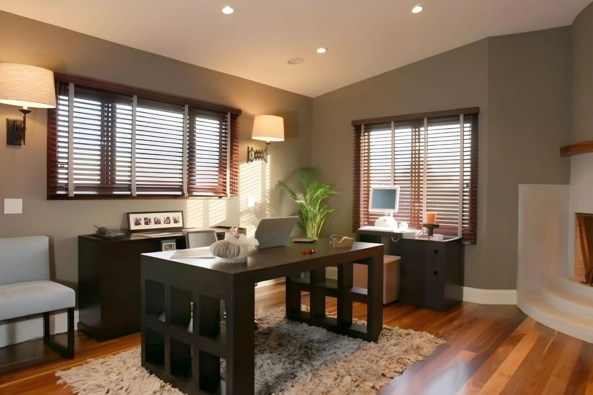 A home office with a desk and a computer on it