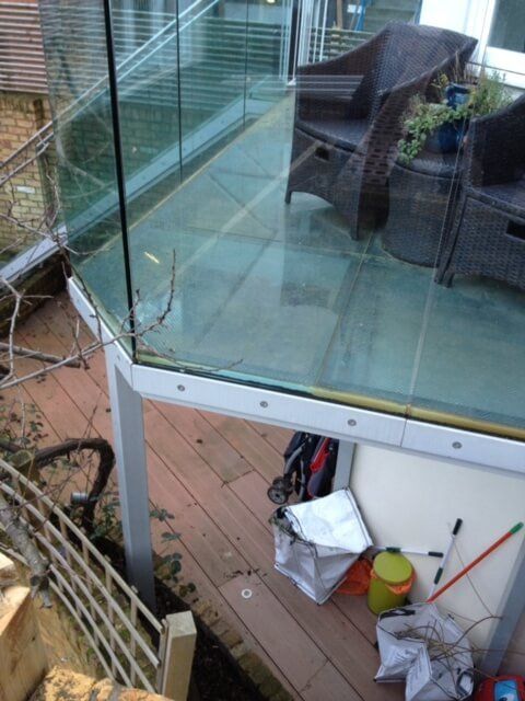 Glass balcony over decking