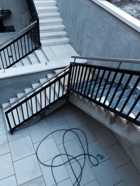 Marble staircase with decorative spiral handrail