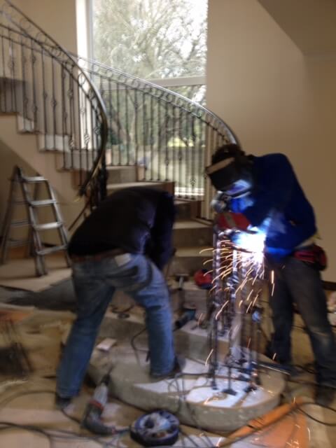 M&M Metalwork staff installing a handrail