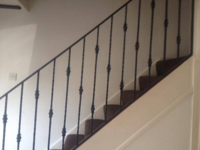 Simple black metal handrail