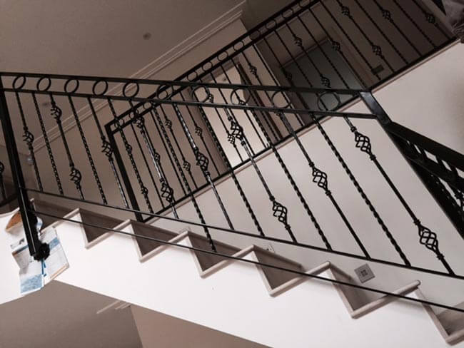 View from below a simple metal handrail