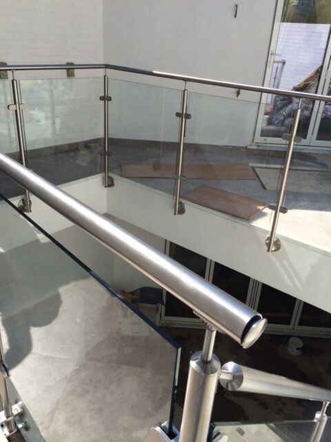 Glass walling with silver handrail