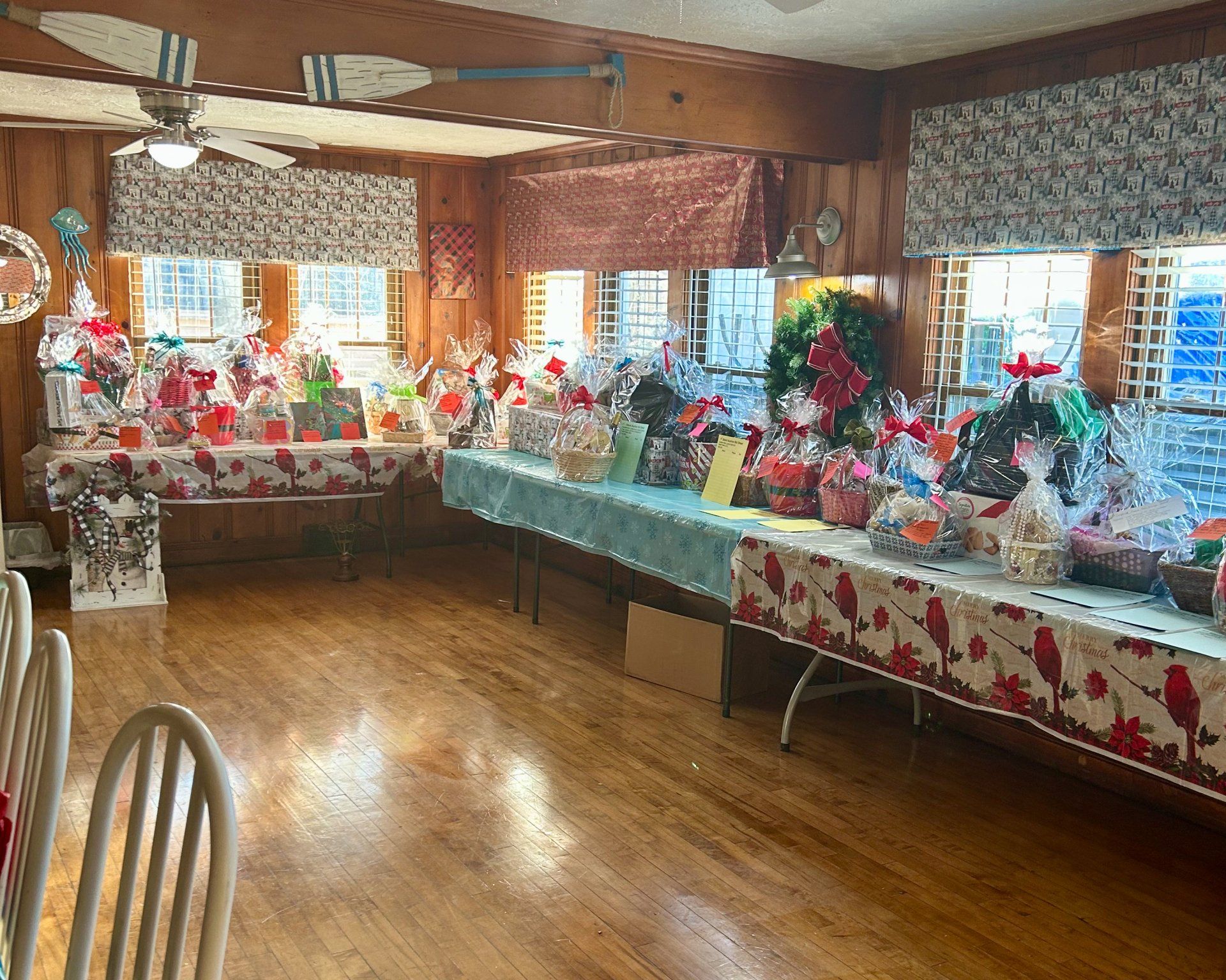 A room filled with lots of baskets on tables.
