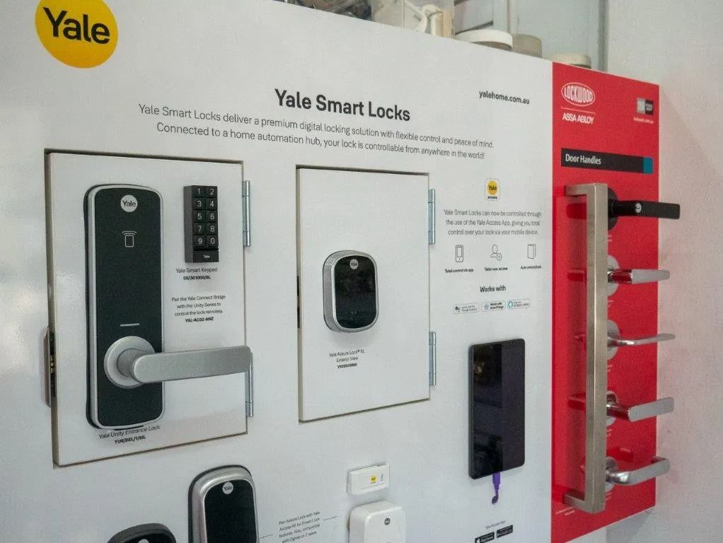 A Display Of Yale Smart Locks On A Wall — Grafton Locksmith Service In Grafton, NSW