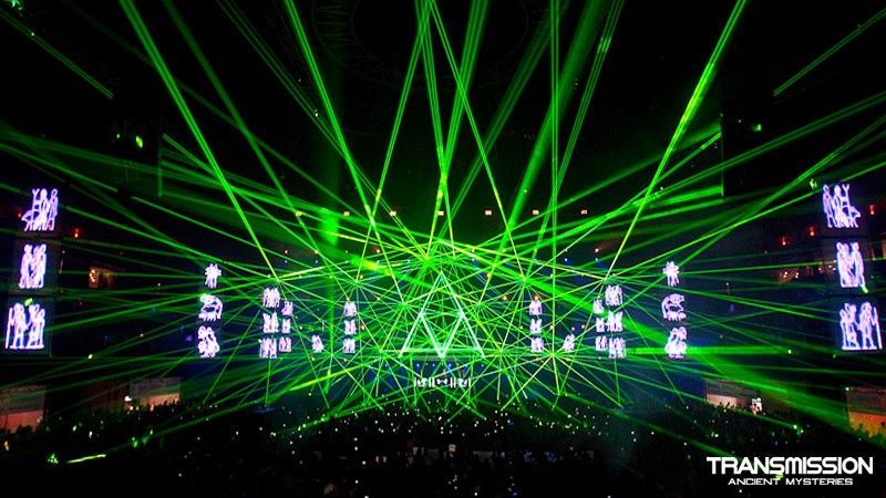 Green laser beams light up a crowded Transmission music festival