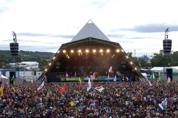 Large Outdoor Festival Stage and Audience at Sunset