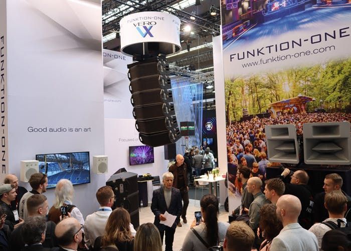 Crowd at Funktion-One audio booth featuring Vero speaker system and branding.
