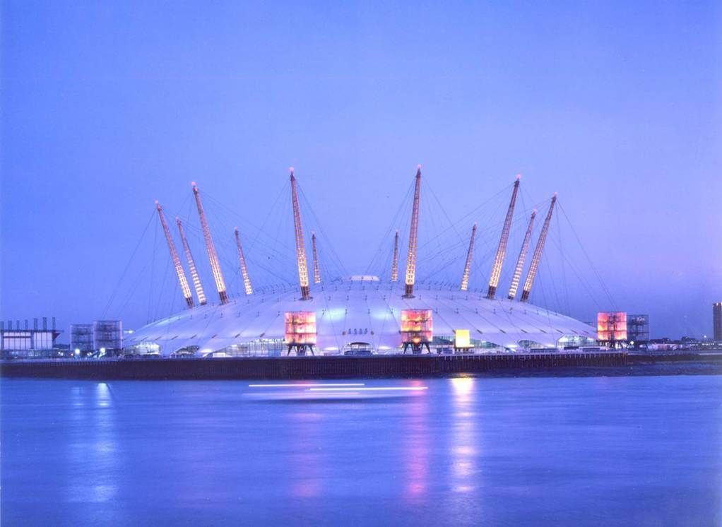 The O2 Arena in London illuminated at night across the river