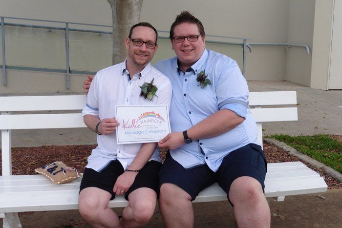 two man holding certificate