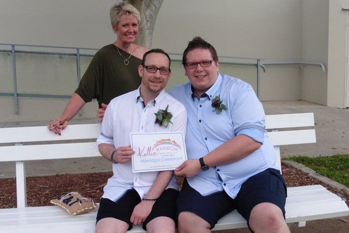 two man- holding certificate