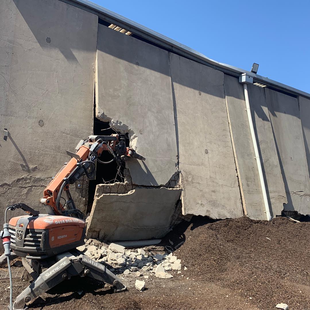 Demolition Robot Breaking The Wall — Rosewater, SA — Supercore