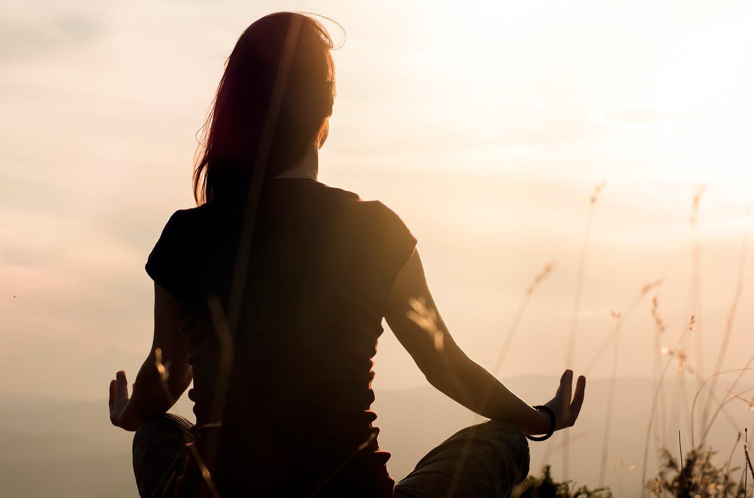 Woman Meditating Outdoor — Tampa, FL — Meta Frequency