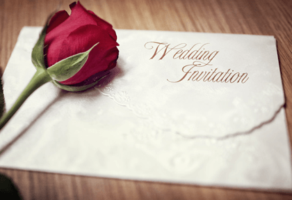wedding invitation card with a rose