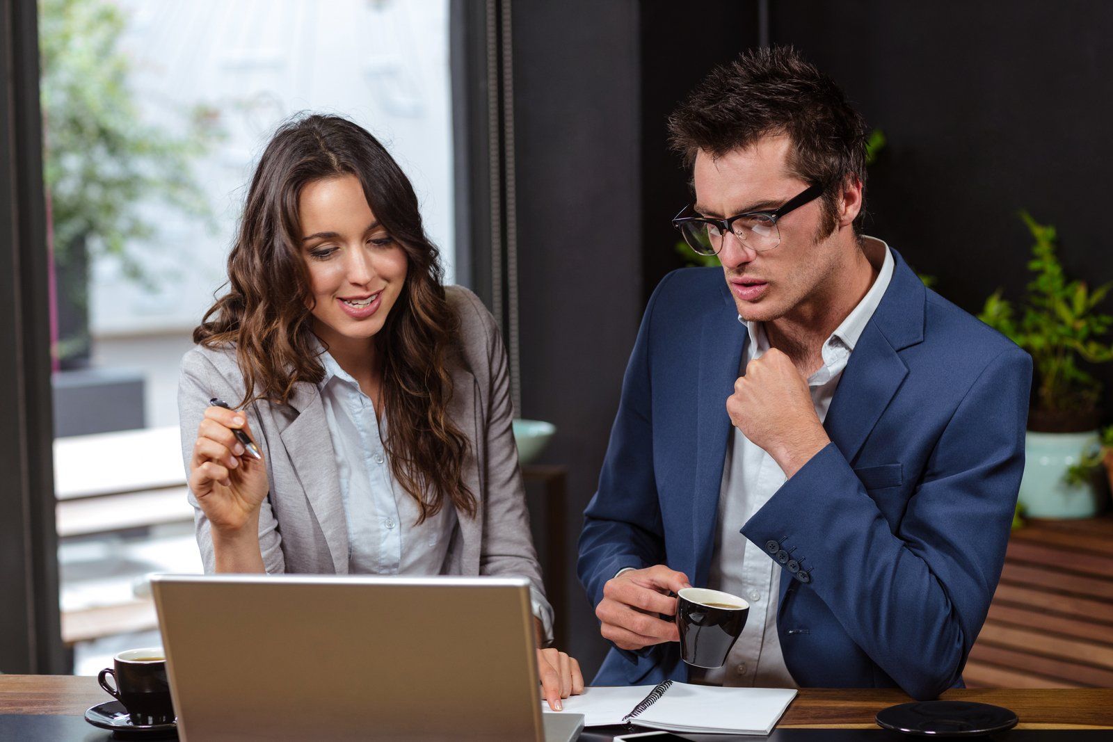 two people looking at the monitor