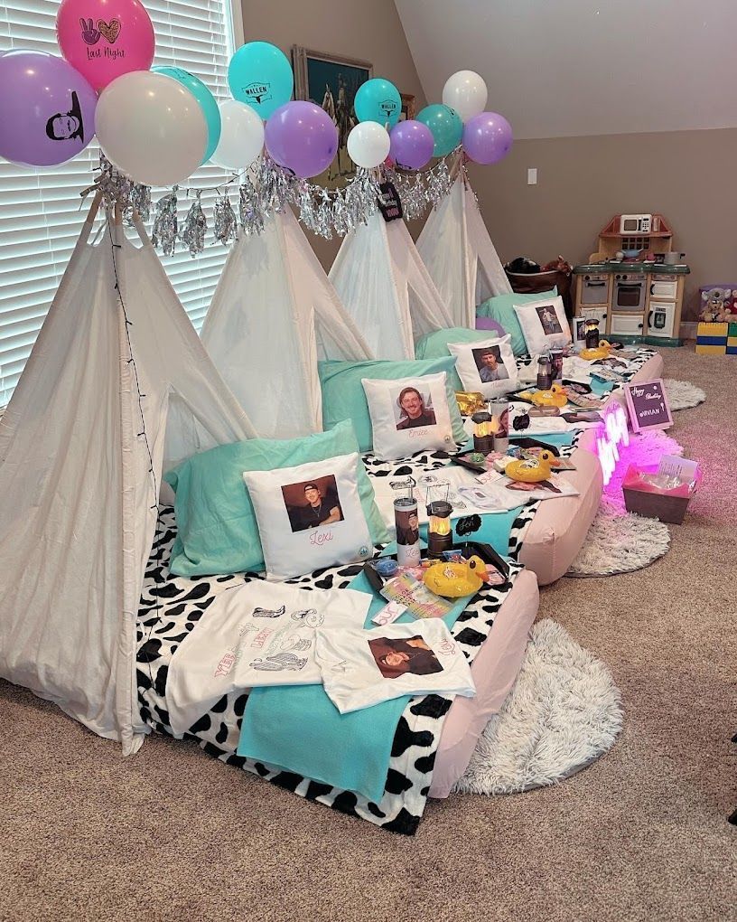 A group of tents are sitting on the floor in a room.