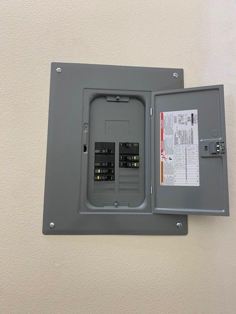 An electrical box with the door open for a Residential Electrical service