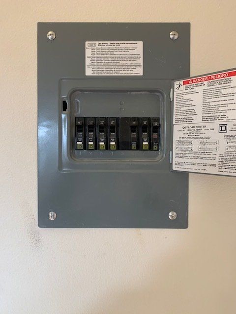 A close up of an electrical box on a wall