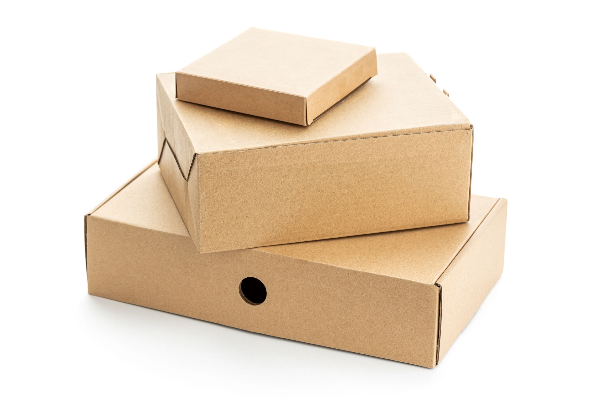 Three stacked brown cardboard boxes.