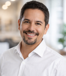 Financial analyst in automotive company office representing client testimonial for network optimization and firewall support services