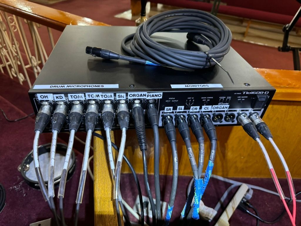 A box with a bunch of wires coming out of it