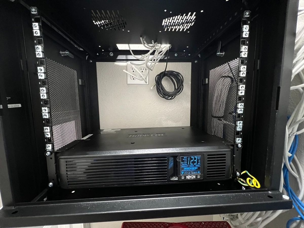 A server rack with a computer inside of it