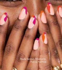 Hands with almond-shaped nails painted nude with bright pink and orange accents.