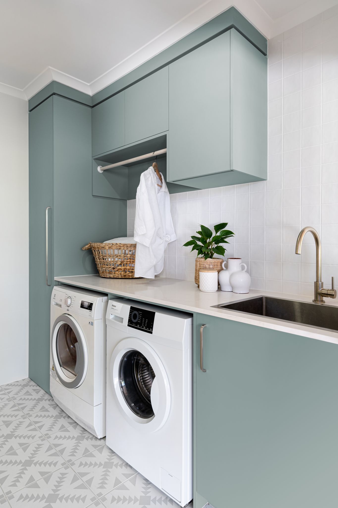 Modern White Bathroom With a Floating Vanity, Black-framed Mirror, and a Wall-mounted Faucet — Akyrah Kitchens in Gympie, QLD