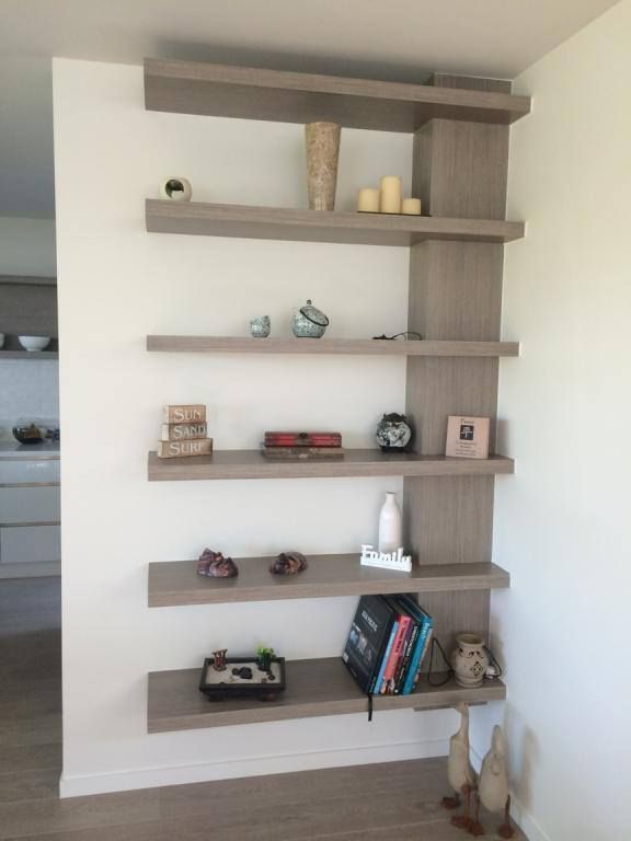 Gray Built-in Corner Shelves Displaying Decor Against a White Wall in a Room — Akyrah Kitchens in Gympie, QLD