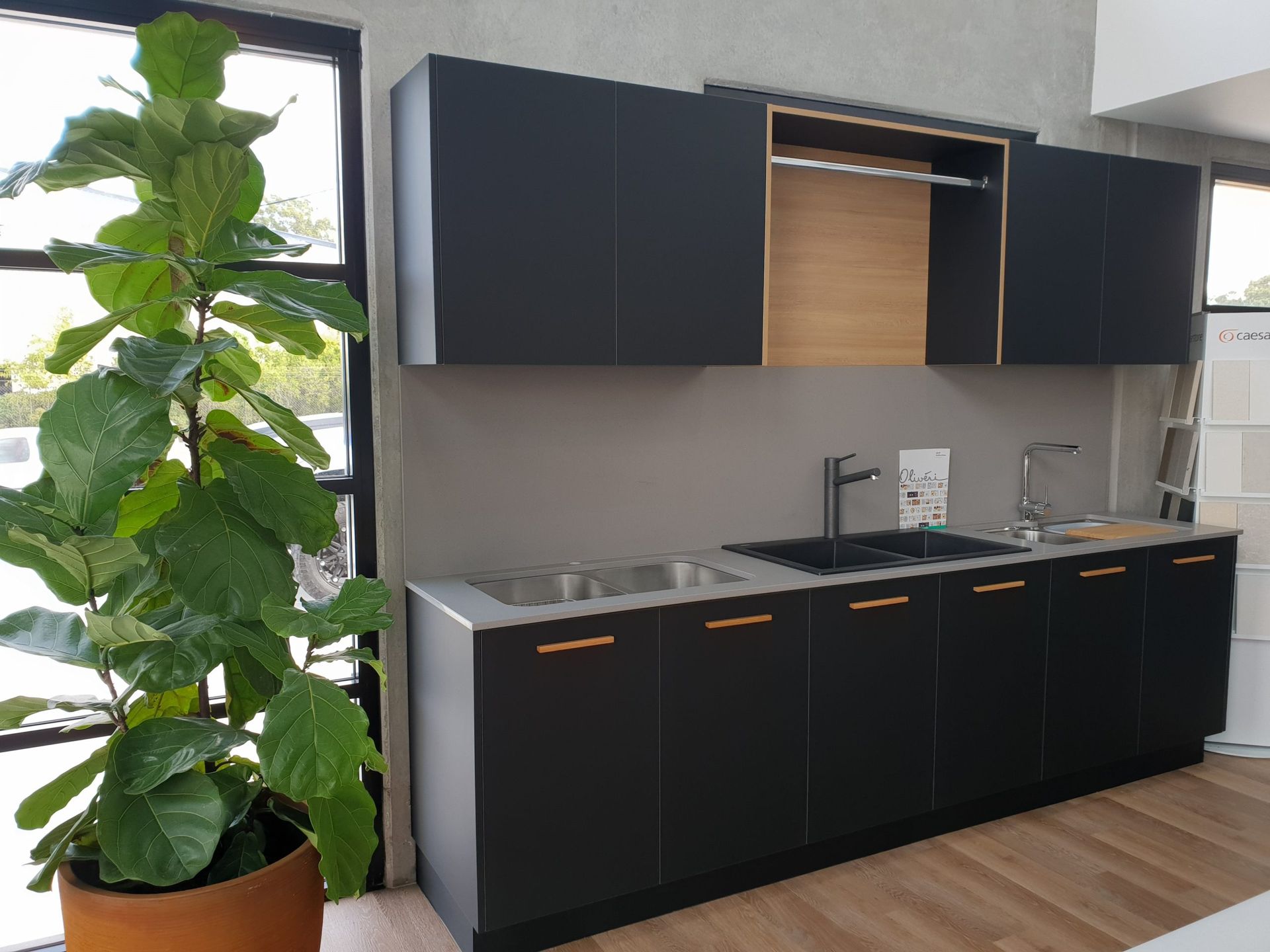 Black Kitchen Cabinetry With Copper Handles and a Double Sink — Akyrah Kitchens in Gympie, QLD