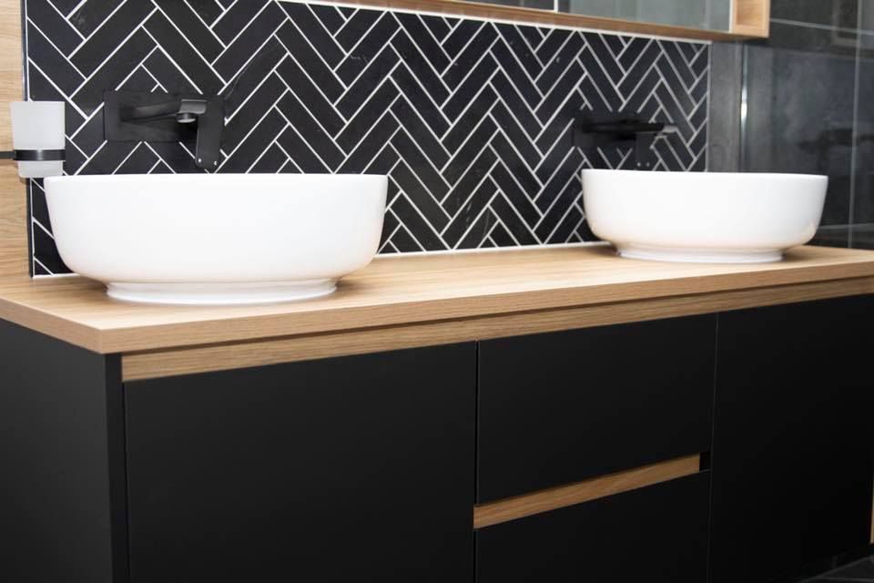 Modern Bathroom Vanity With Two White Bowl Sinks on a Wood Countertop, Black Cabinets — Akyrah Kitchens in Gympie, QLD