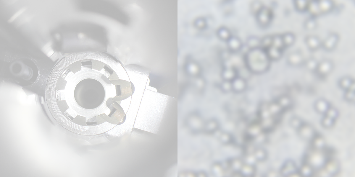 A close up of a gun barrel and a blurred image of chemical close up.