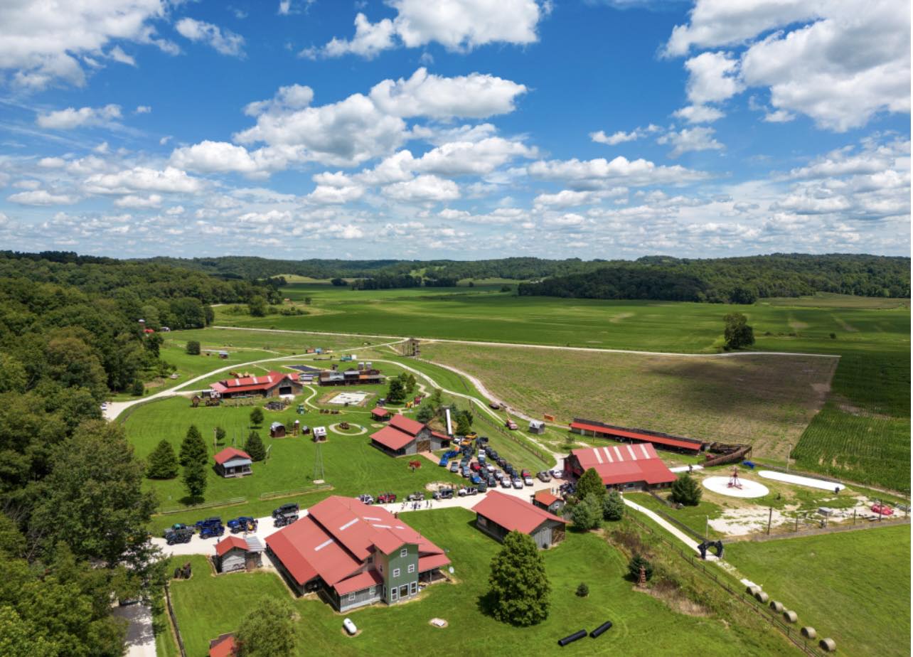 An aerial view of a farm on a sunny day