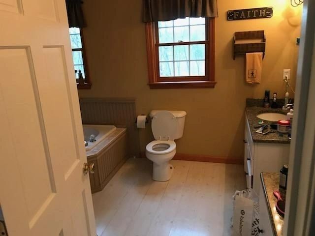 A bathroom with a sign that says faiths on it