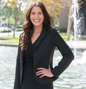 Celina Estrada, Esq., Associate Attorney at Harris & McKeown Law Firm, in black blazer outdoors