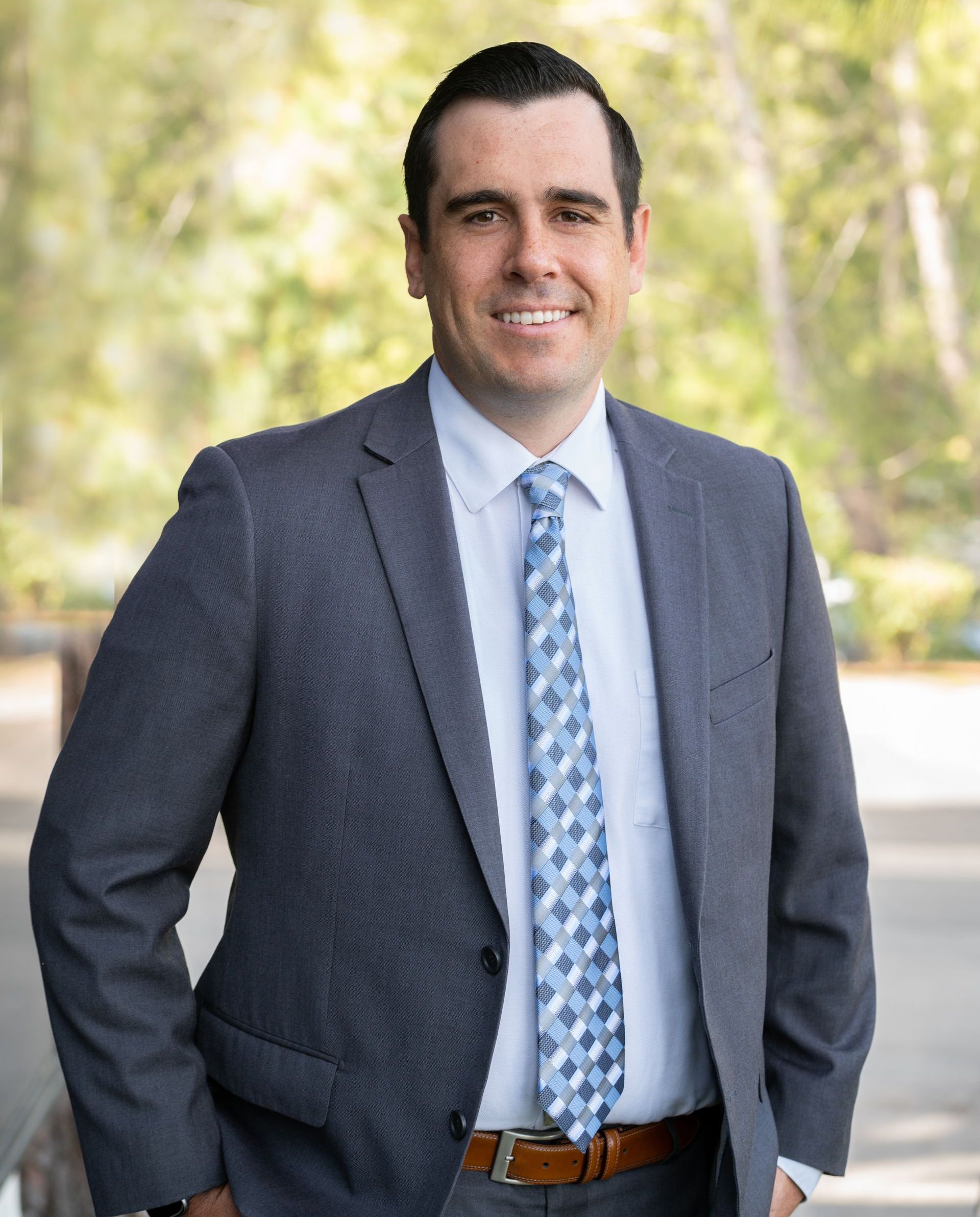 Andrew McKeown, Esq., Partner at Harris & McKeown Law Firm, wearing a suit and tie