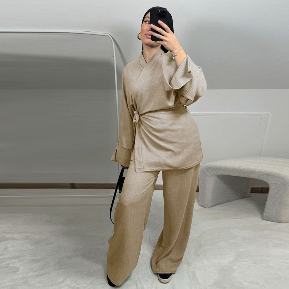 A woman is taking a picture of herself in front of a mirror.
