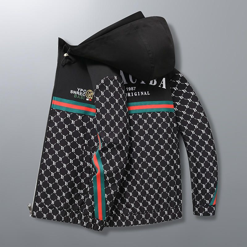A black jacket with a hood and a pattern on it