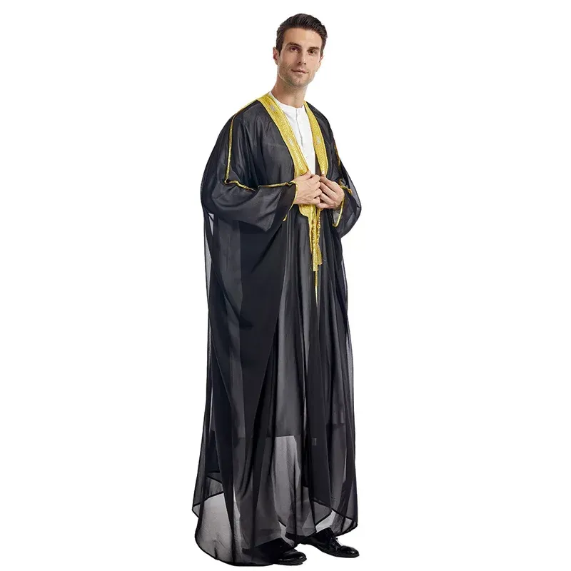 A man is wearing a black robe with yellow trim.