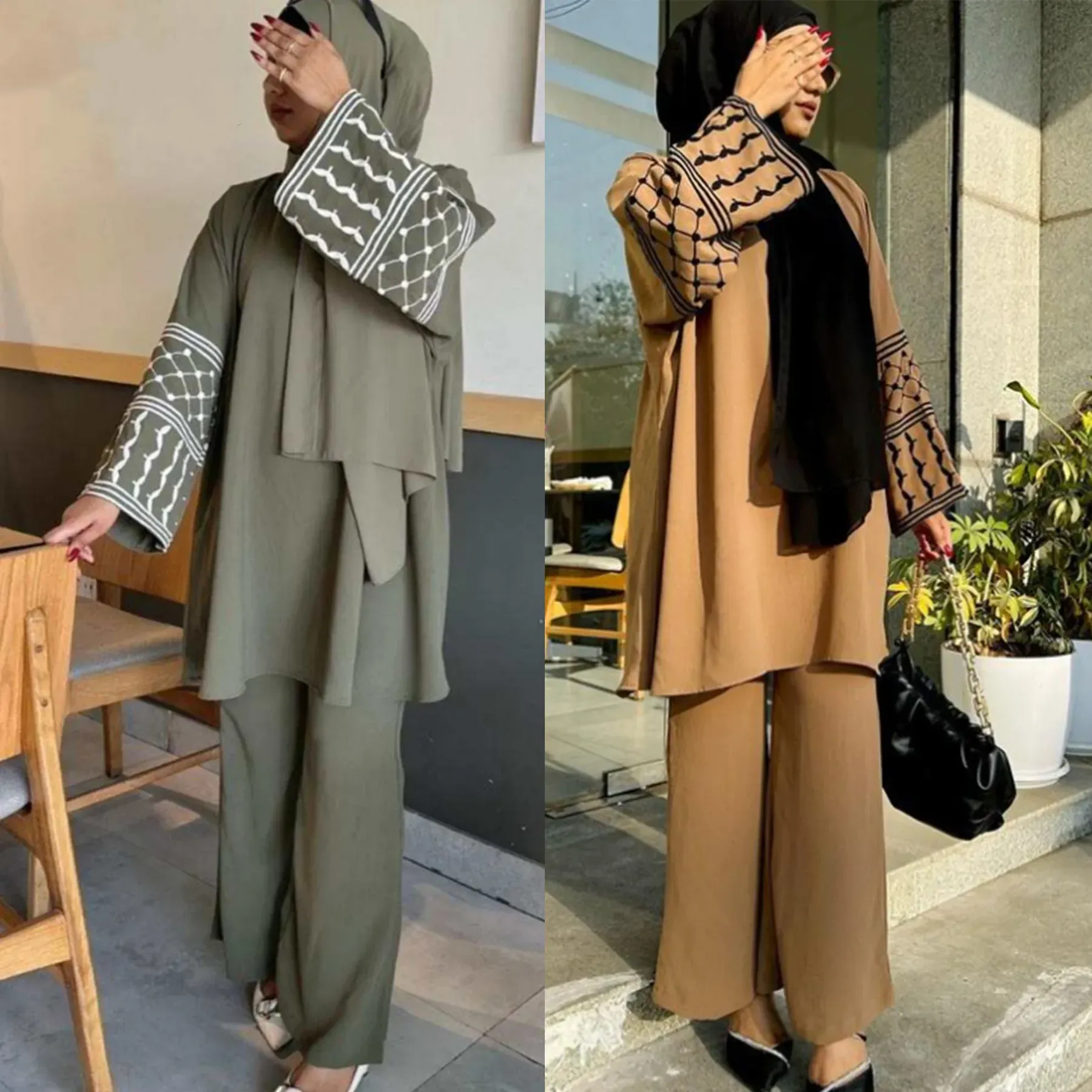 Two women are standing next to each other wearing hijabs and abayas.