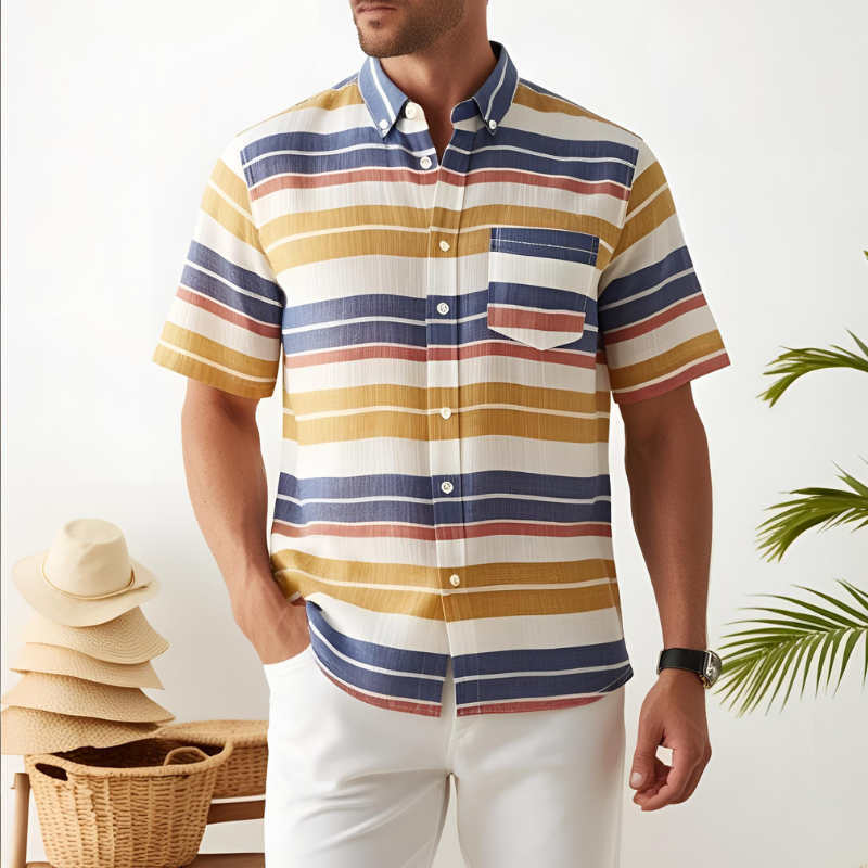 A man is wearing a white shirt and tan pants